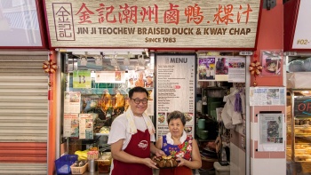 Owners outside the Jin Ji Teowchew Braised Duck And Kway Chap Store Facade, located at Chinatown Complex Food Centre