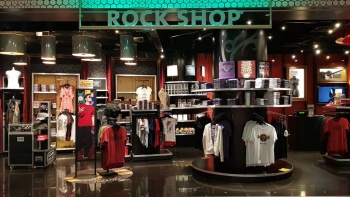 Entrance of the Rock Shop displaying shirts and Hard Rock souvenir products